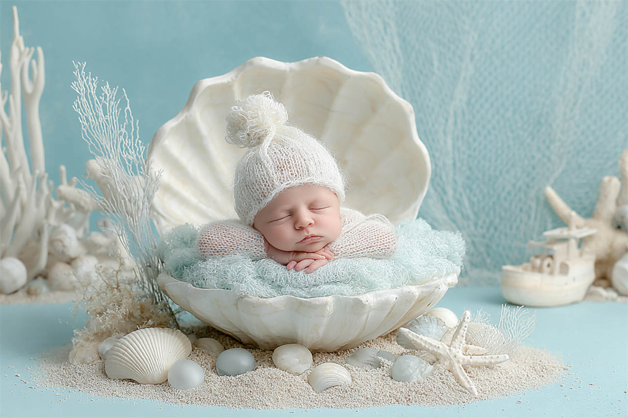 Tiny newborn nestled in a knitted layer, newborn photography Melbourne