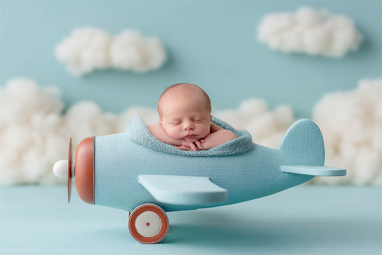 Peaceful newborn with a delicate flower headband, Melbourne newborn & baby studio