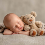 Newborn cradled in soft fur and florals, newborn photography Melbourne