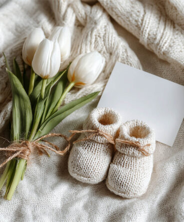 Peaceful newborn with a delicate flower headband, Melbourne newborn and maternity photography