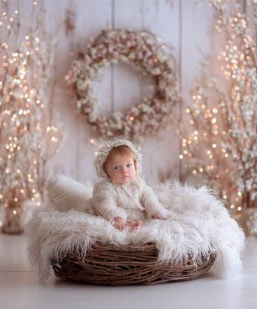 Baby settled snugly in a woven basket, Melbourne newborn and maternity photography