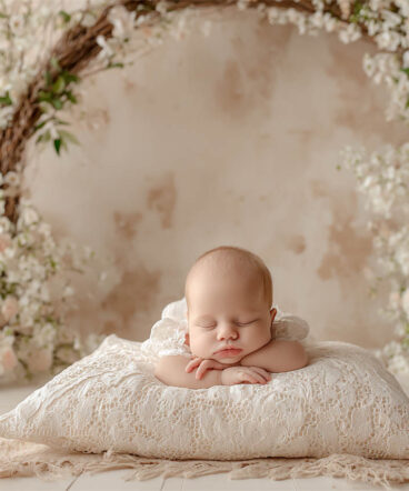 Newborn cradled in soft fur and florals, newborn photography Melbourne